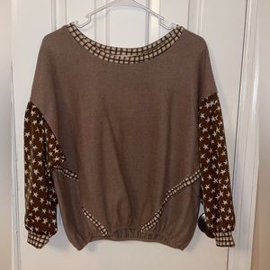 cute sweater it’s a large but fits like a medium